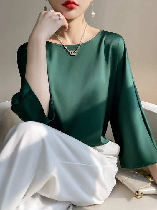 Blouse en satin vert émeraude
